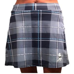 Running skirt blue plaid size 6 or Medium. Lightweight performance with 2 pocket